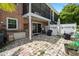 Brick backyard with a patio and pond views at 13684 Orange Sunset Dr # 101, Tampa, FL 33618