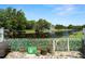 Backyard paver patio with views of the serene pond at 13684 Orange Sunset Dr # 101, Tampa, FL 33618