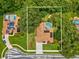 Aerial view of property showcasing backyard pools, mature trees, and an expansive lawn at 18803 Misty Shores Ln, Lutz, FL 33548