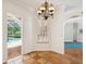 Bright dining room with views of the pool and access to the backyard at 18803 Misty Shores Ln, Lutz, FL 33548