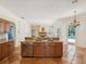 Large kitchen island overlooks the living room and backyard pool at 18803 Misty Shores Ln, Lutz, FL 33548