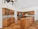 Spacious kitchen with stainless steel appliances and granite countertops at 18803 Misty Shores Ln, Lutz, FL 33548