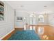 The house has hardwood floors and a large living area with crown molding at 18803 Misty Shores Ln, Lutz, FL 33548