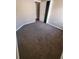 Carpeted bedroom with neutral walls and a closet for storage at 19239 Stone Hedge Dr, Tampa, FL 33647
