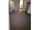 A spacious bedroom with neutral carpet has a connecting vanity and walk-in closet at 19239 Stone Hedge Dr, Tampa, FL 33647