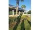 Community space featuring a covered picnic area with stone columns and lush landscaping at 19239 Stone Hedge Dr, Tampa, FL 33647