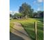 Well-maintained community playground featuring a walking path and shaded play areas at 19239 Stone Hedge Dr, Tampa, FL 33647