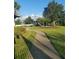 Inviting community playground featuring a walking path and shaded play areas at 19239 Stone Hedge Dr, Tampa, FL 33647
