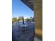 Community pool area with tables and chairs by a clear blue pool at 19239 Stone Hedge Dr, Tampa, FL 33647