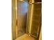 Bathroom shower with tiled walls, a glass door, and built-in shelving at 19239 Stone Hedge Dr, Tampa, FL 33647