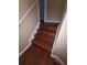 Wooden staircase that provides access to the next level of the home at 19239 Stone Hedge Dr, Tampa, FL 33647
