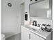 Bright bathroom featuring a modern vanity with sleek fixtures, a framed mirror, and stylish accents at 2306 41St E St, Bradenton, FL 34208