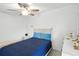 Comfortable bedroom with neutral decor, a queen bed, and a ceiling fan at 2306 41St E St, Bradenton, FL 34208