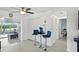 Open living area features barstool seating, access to a waterfront screened-in patio and plenty of storage at 2306 41St E St, Bradenton, FL 34208