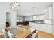 Open concept dining room and living room layout offers great flow for entertaining and everyday living at 2506 S Obrapia St, Tampa, FL 33629