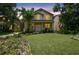 Charming two-story home with a welcoming front porch and well-maintained lawn at 2506 S Obrapia St, Tampa, FL 33629