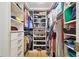 Walk-in closet with custom shelving and plenty of storage space at 2506 S Obrapia St, Tampa, FL 33629