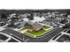 Aerial view of a well-kept single-Gathering home with a manicured lawn on a corner lot near a pond at 25946 Buckthorn Ave, Land O Lakes, FL 34639