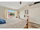 This bedroom features vaulted ceilings, a window view, and ample closet space at 267 Countryside Key Blvd, Oldsmar, FL 34677