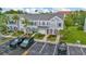 Attractive townhomes with a well-maintained exterior, private parking, and neatly manicured lawns at 267 Countryside Key Blvd, Oldsmar, FL 34677
