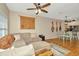 Open-concept living area flows into a dining space with unique decor and comfortable seating at 267 Countryside Key Blvd, Oldsmar, FL 34677