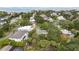 An aerial view of a neighborhood with lush greenery and waterfront access at 3108 S Omar Ave, Tampa, FL 33629