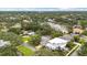 Aerial view of residential neighborhood featuring homes and mature trees at 3108 S Omar Ave, Tampa, FL 33629