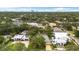 Stunning aerial view of the neighborhood showcasing lush greenery and beautiful homes, including the featured property at 3108 S Omar Ave, Tampa, FL 33629