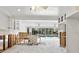 Bright living area with pool access, featuring white cabinetry and ceiling fans at 3108 S Omar Ave, Tampa, FL 33629