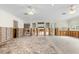 Large living area with plenty of natural light, needs a renovation to make it your own at 3108 S Omar Ave, Tampa, FL 33629