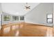 Bright bedroom with vaulted ceilings, bamboo flooring, and large windows at 3269 Nicks Pl, Clearwater, FL 33761