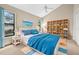 Bedroom featuring a vaulted ceiling, ceiling fan, and bright, natural light at 3269 Nicks Pl, Clearwater, FL 33761
