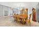 Spacious dining room with a wooden table, chandelier, and decorative accents at 3269 Nicks Pl, Clearwater, FL 33761