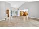 Elegant foyer featuring tile floors, high ceilings, and a chandelier, leading into a dining area at 3269 Nicks Pl, Clearwater, FL 33761
