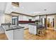 Kitchen with an island, stainless steel appliances, and an open floor plan at 3269 Nicks Pl, Clearwater, FL 33761