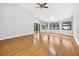 Spacious living room with bamboo flooring, vaulted ceilings, and bright natural light at 3269 Nicks Pl, Clearwater, FL 33761