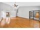 Large living room has bamboo floors, vaulted ceilings, and sliding glass doors at 3269 Nicks Pl, Clearwater, FL 33761