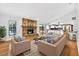 Inviting living room with fireplace, modern sofas, and neutral tones at 3269 Nicks Pl, Clearwater, FL 33761