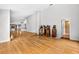 Open concept living room featuring bar area, kitchen view, and classic jukebox at 3269 Nicks Pl, Clearwater, FL 33761
