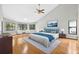 Main bedroom features bamboo flooring, vaulted ceilings, and lots of natural light at 3269 Nicks Pl, Clearwater, FL 33761