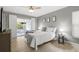 Relaxing bedroom with a view to a private outdoor pool area at 3501 Sarazen Dr, New Port Richey, FL 34655
