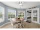 Sunny breakfast nook with large windows and plenty of natural light at 3501 Sarazen Dr, New Port Richey, FL 34655