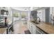Kitchen boasts a breakfast nook, granite counters, and stainless appliances at 3501 Sarazen Dr, New Port Richey, FL 34655