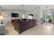 Spacious living room with modern flooring, comfortable sofa, and ample natural light at 3501 Sarazen Dr, New Port Richey, FL 34655