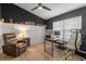 Home office features a desk, chair, and comfortable leather recliner at 3501 Sarazen Dr, New Port Richey, FL 34655