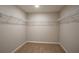 Walk-in closet with carpet and wire shelving for optimal storage at 36933 Sagemoor Dr, Zephyrhills, FL 33541