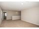 Upstairs living area featuring soft carpeting, natural light, and neutral paint at 36933 Sagemoor Dr, Zephyrhills, FL 33541