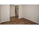 Light and airy living area featuring hard surface floors and neutral paint at 36933 Sagemoor Dr, Zephyrhills, FL 33541