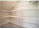 Spacious storage area with multiple wire shelves, perfect for organized storage at 36933 Sagemoor Dr, Zephyrhills, FL 33541