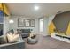 A comfortable living room with stylish decor, modern furniture, and unique art pieces for a relaxing ambiance at 37092 Sagemoor Dr, Zephyrhills, FL 33541